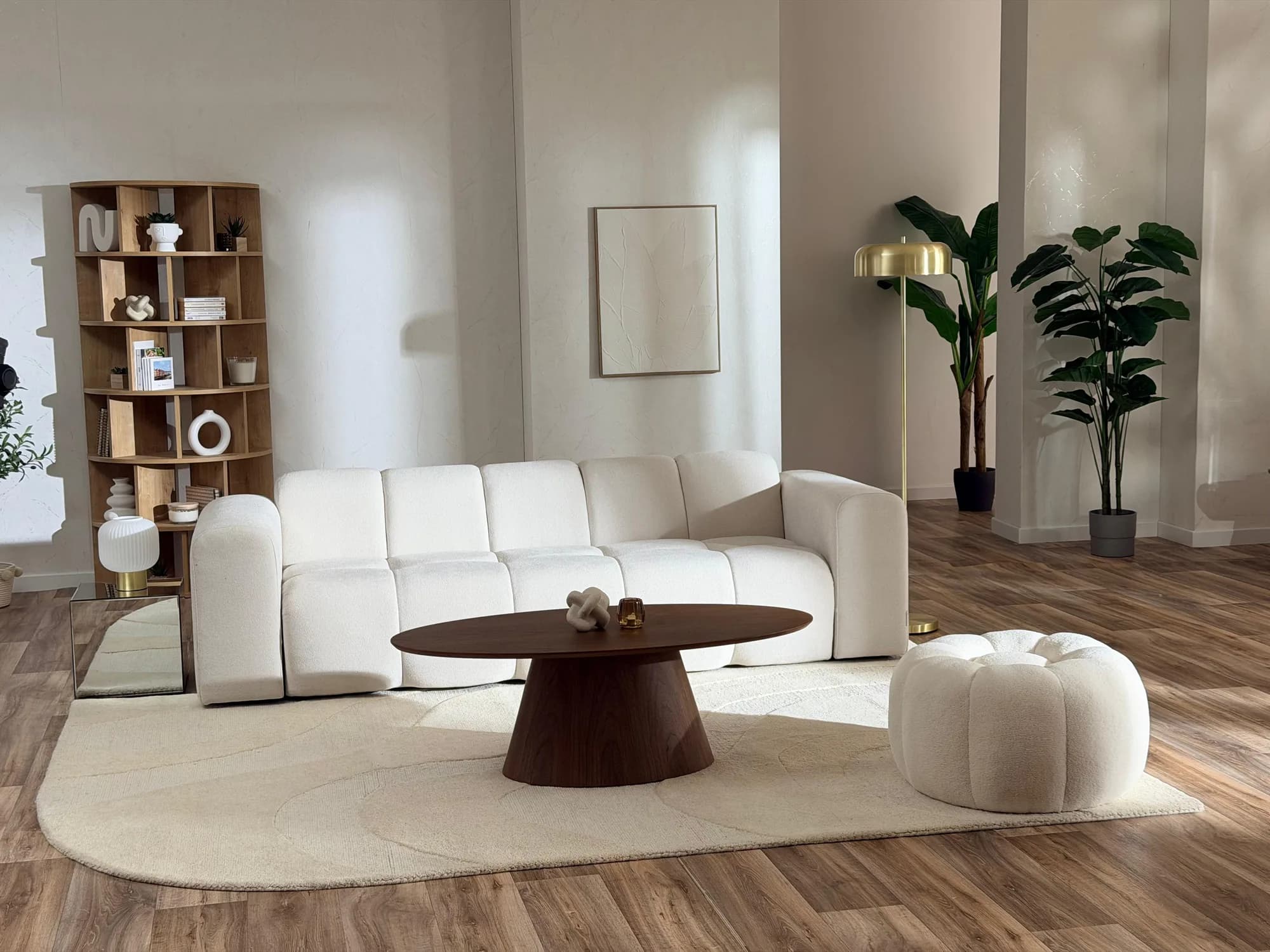 Apartment set at Gust Studios: white sofa, coffee table and gold floor lamp